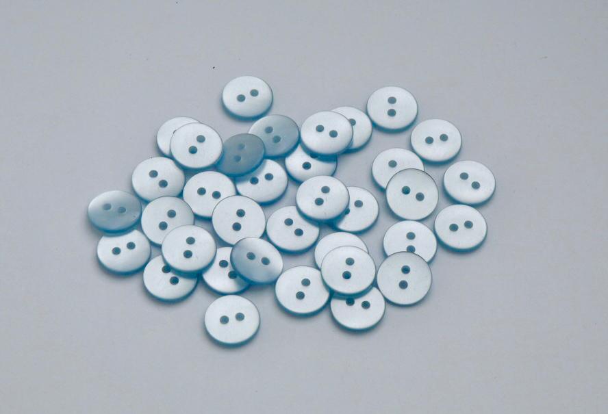 Knoflík dvoudírkový plastový 12 mm Barva: světle modrý