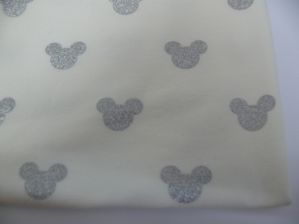 Teplákovina stříbrné hlavičky na smetanové