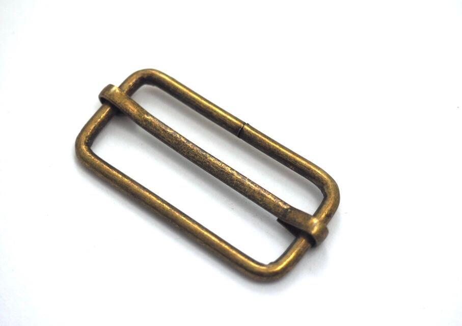 Posunovač 17 x 38 mm staromosaz