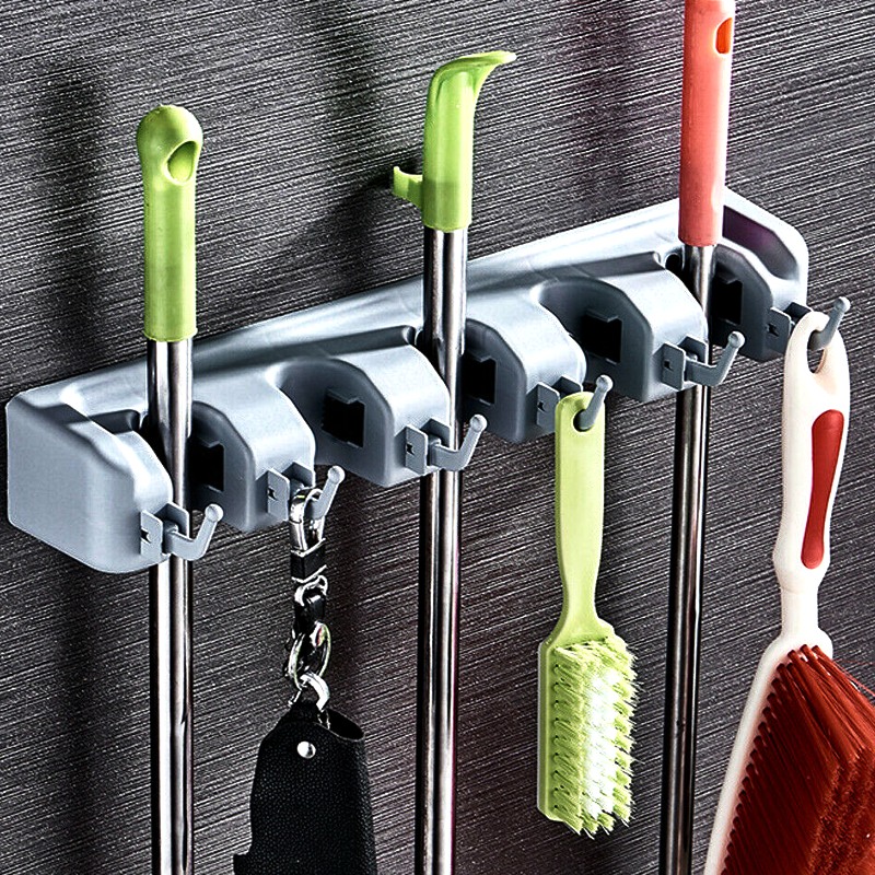 Praktický držák na mopy a úklidové pomůcky InSleva.cz